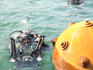 Protecziun da la patria, Massimiliano Monaco, artificiere subacqueo e fotografo, Photo © Davide Fontana