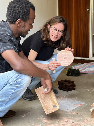 Nairobi roller skates, David Thuku and Luisa Turuani while assembling Nairobi roller skates